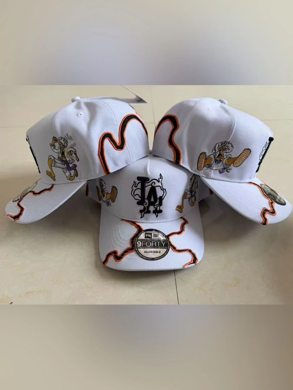 One Piece New Era White LA Embroidered 9FORTY Cap with Orange and Black Accents